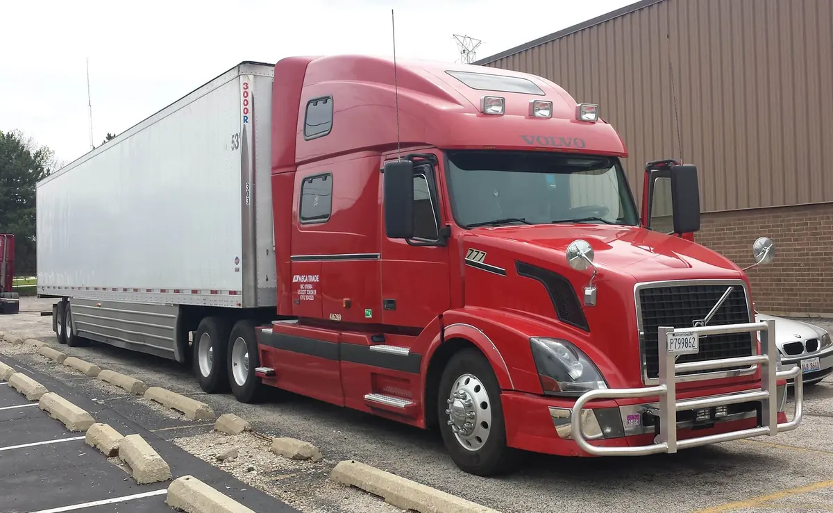 Red Mega Trade Volvo VNL truck